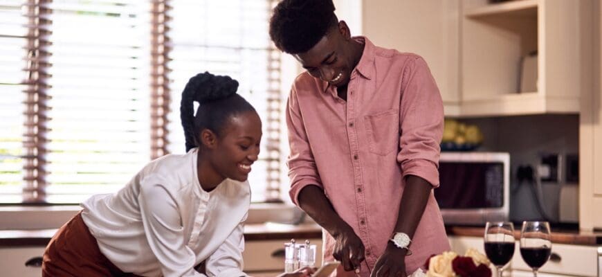 Cooking,,Kitchen,And,Black,Couple,In,Home,With,Wine,Cutting